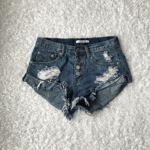 Distressed denim shorts